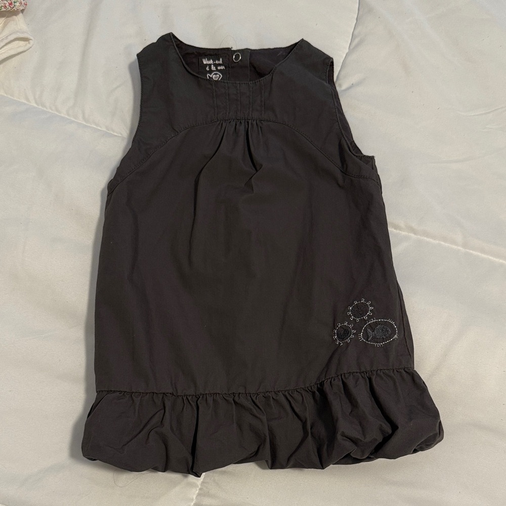 Black Sleeveless Dress with Ruffle Hem